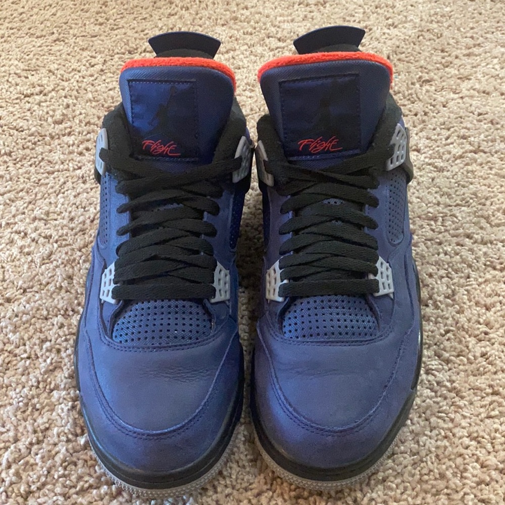Navy blue and red Jordan sneakers